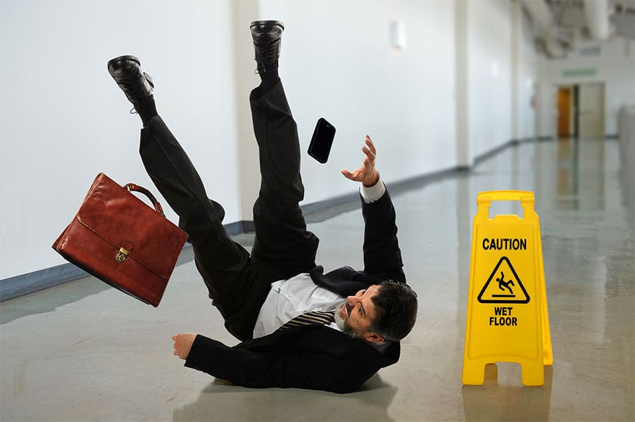 Man falling on a wet floor